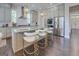 Spacious kitchen featuring modern appliances, ample counter space, and stylish pendant lighting at 1461 Thomas St, Conyers, GA 30094