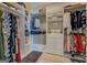Spacious walk-in closet features lots of shelving, drawers, and hanging space for ample storage at 1461 Thomas St, Conyers, GA 30094