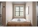 Bright bathroom with a large soaking tub and a window with plantation shutters at 240 Trotters Rdg, Fayetteville, GA 30215