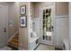 Cozy entryway with a bench, storage, and natural light from the door at 240 Trotters Rdg, Fayetteville, GA 30215