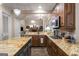 Spacious kitchen featuring custom island, granite countertops and stainless steel appliances at 240 Trotters Rdg, Fayetteville, GA 30215