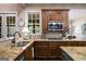 Gourmet kitchen with granite countertops, stainless steel appliances, and custom cabinetry at 240 Trotters Rdg, Fayetteville, GA 30215