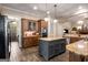 Well-appointed kitchen with a center island, custom cabinets and a unique brick floor at 240 Trotters Rdg, Fayetteville, GA 30215