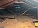 This attic features exposed wood beams and boarded floor at 2980 Catalina Dr, Decatur, GA 30032