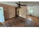 Cozy living area with hardwood floors, ceiling fan, and access to multiple rooms at 2980 Catalina Dr, Decatur, GA 30032
