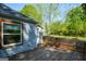 Wooden deck overlooking the backyard, attached to a house with light blue siding at 3164 Harris Dr, East Point, GA 30344