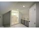 Bright and unique bathroom featuring a walk in shower and double vanity at 3164 Harris Dr, East Point, GA 30344