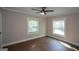 Bedroom featuring hardwood floors, natural light, and ceiling fan at 3164 Harris Dr, East Point, GA 30344