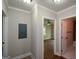 Hallway view featuring hardwood floors and doorways leading to other rooms at 3164 Harris Dr, East Point, GA 30344