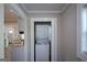 Laundry closet that features a stacked washer and dryer at 3164 Harris Dr, East Point, GA 30344