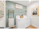 Cozy laundry room with updated appliances and modern décor offers functionality and style at 1020 Sutherland Lane # 41, Lawrenceville, GA 30043