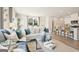 Spacious living room seamlessly connects to the kitchen with stylish decor and ample seating at 1020 Sutherland Lane # 43, Lawrenceville, GA 30043