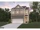 Charming two-story home featuring a brick and siding exterior, a two-car garage, and a well-manicured lawn at 1028 Sutherland Lane # 45, Lawrenceville, GA 30043