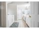 Bathroom featuring a walk-in tub, vanity, and tiled floors at 12843 Simmons Rd, Hampton, GA 30228