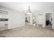 Spacious living room showcasing open floor plan and view of the front entrance at 12843 Simmons Rd, Hampton, GA 30228