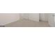 Bedroom has neutral carpet and features white doors to closets and other rooms at 335 Silver Moon Dr, Loganville, GA 30052