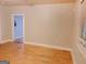Living room with hardwood floors, natural light, and neutral walls at 674 Jett Nw St, Atlanta, GA 30318