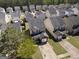 Aerial shot of a residential community showcasing well-maintained homes with private driveways and mature trees at 7756 Newbury Dr, Jonesboro, GA 30236