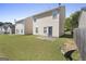 Spacious backyard with a patio, and potential for outdoor activities and relaxation at 7756 Newbury Dr, Jonesboro, GA 30236