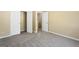 Bedroom with carpet, neutral walls, and closet space at 7756 Newbury Dr, Jonesboro, GA 30236