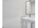 Powder room featuring pedestal sink with modern faucet and large mirror at 5389 Tolar Road # 36, South Fulton, GA 30213