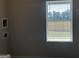 Bedroom featuring a window with blinds, neutral paint, and natural light at 5360 Tolar Rd # 72, South Fulton, GA 30213
