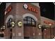 Exterior view of Kiku Japanese Steakhouse at night, decorated with wreaths at 5360 Tolar Rd # 72, South Fulton, GA 30213