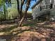 Fenced backyard featuring stairs to a basement entry at 363 Palmetto Rd, Tyrone, GA 30290