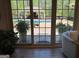 View from indoors to the backyard featuring a pool and an elegant gazebo at 363 Palmetto Rd, Tyrone, GA 30290