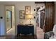 Bathroom with a glass shower, black and white patterned floor and access to a walk in closet at 363 Palmetto Rd, Tyrone, GA 30290