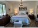 Serene bedroom with warm lighting, comfortable bedding, and ample natural light at 363 Palmetto Rd, Tyrone, GA 30290