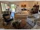 Bright living room featuring a comfortable seating arrangement, stylish decor, and an inviting atmosphere at 363 Palmetto Rd, Tyrone, GA 30290