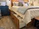 Bedroom features storage space beneath the bed with convenient pull-out drawers at 363 Palmetto Rd, Tyrone, GA 30290
