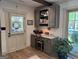 This home office space includes backyard access, a work station, and overhead storage at 363 Palmetto Rd, Tyrone, GA 30290