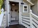Interior view of a small outhouse with a quaint design, fish decor, and a vintage-style sink at 363 Palmetto Rd, Tyrone, GA 30290