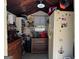 The shed interior is spacious enough to include a fridge, dresser, and storage area at 363 Palmetto Rd, Tyrone, GA 30290