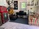 The interior of the shed is spacious enough to include a piano and seating area at 363 Palmetto Rd, Tyrone, GA 30290