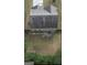 Aerial view of the backyard with a patio set and a neatly fenced perimeter at 6539 Saint Mark Way, Fairburn, GA 30213