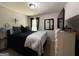 Bedroom with a cozy bed, stylish decorations, and ample natural light from the window at 6539 Saint Mark Way, Fairburn, GA 30213