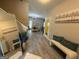 Open hallway leading to dining and living areas, creating a seamless flow at 6539 Saint Mark Way, Fairburn, GA 30213