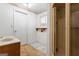 Bathroom includes vanity, shower, storage, and a small window for natural light at 30 Circle Dr, Hampton, GA 30228