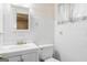 Bathroom featuring classic white tile, a vanity, and updated fixtures at 30 Circle Dr, Hampton, GA 30228