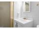 Bathroom features a vanity with gold fixtures, tiling, and a shower at 30 Circle Dr, Hampton, GA 30228