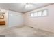 View of a bedroom with carpet and direct access to an ensuite bathroom at 30 Circle Dr, Hampton, GA 30228