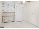 This bedroom offers a vintage closet and dresser, with a simple ceiling fan and durable flooring at 30 Circle Dr, Hampton, GA 30228