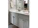 Elegant bathroom featuring a double vanity with modern fixtures and neutral decor at 160 Elysian Dr, Fayetteville, GA 30214