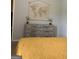 Tastefully decorated bedroom boasts a dresser and a world map tapestry, creating a focal point at 160 Elysian Dr, Fayetteville, GA 30214