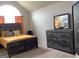 Comfortable bedroom features grey dresser, creating a relaxing and inviting space at 160 Elysian Dr, Fayetteville, GA 30214