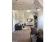 Comfortable bedroom with ample space, featuring a sitting area and entertainment center at 160 Elysian Dr, Fayetteville, GA 30214