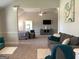 Inviting bedroom featuring a seating area, TV, and open layout connecting to a sitting room at 160 Elysian Dr, Fayetteville, GA 30214